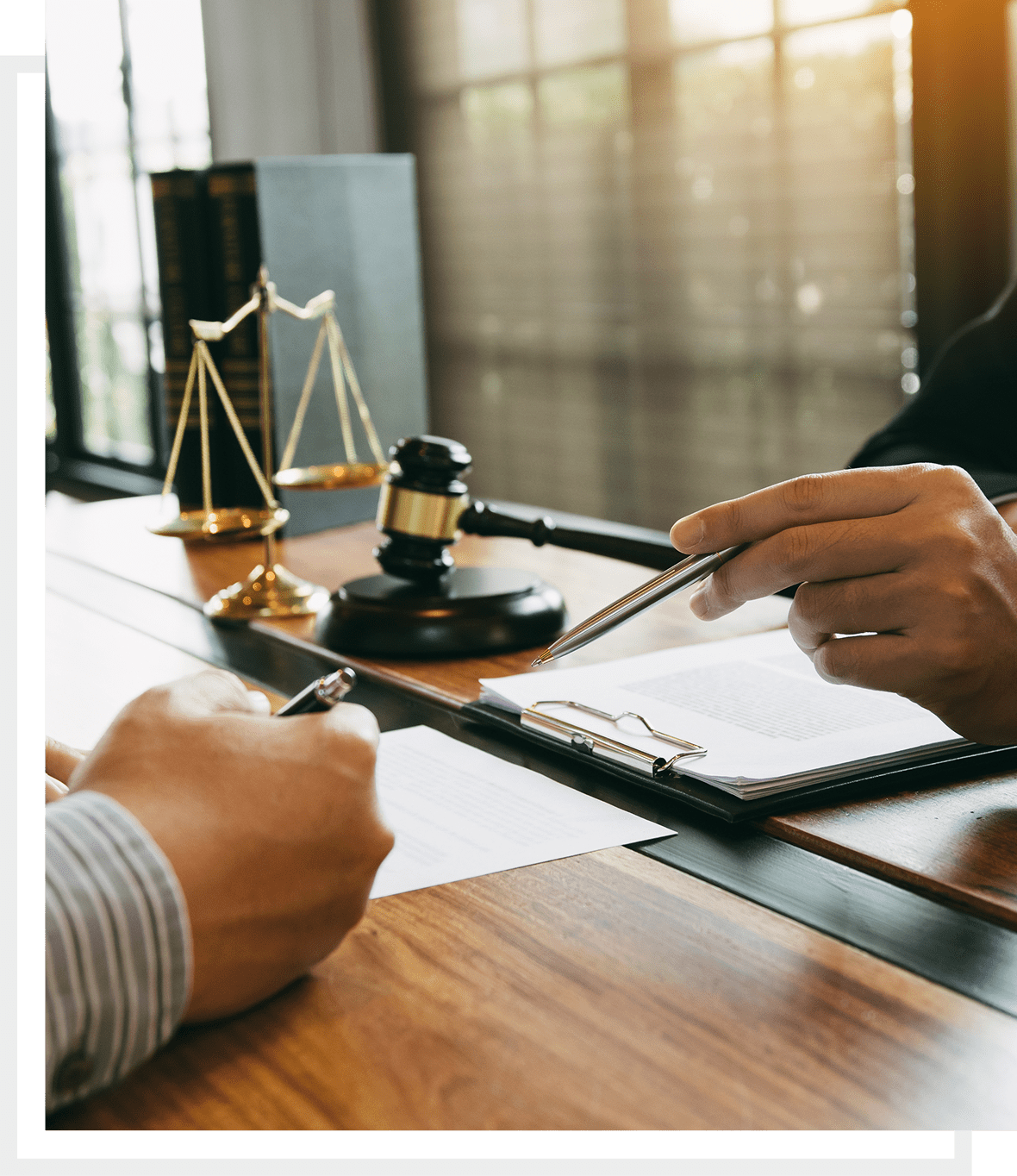 Hands negotiating in a law office